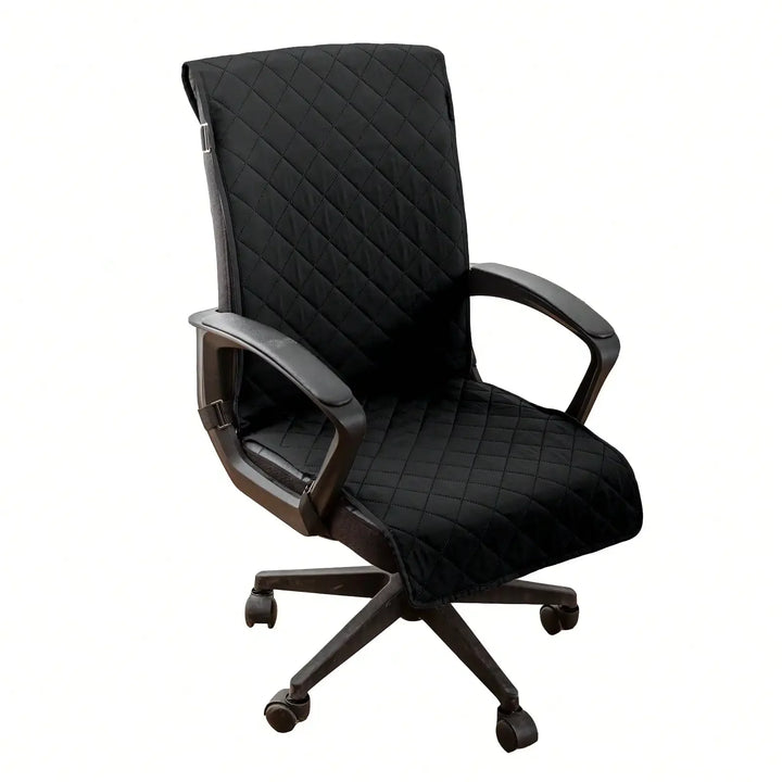 Black office chair with quilted design on a white background