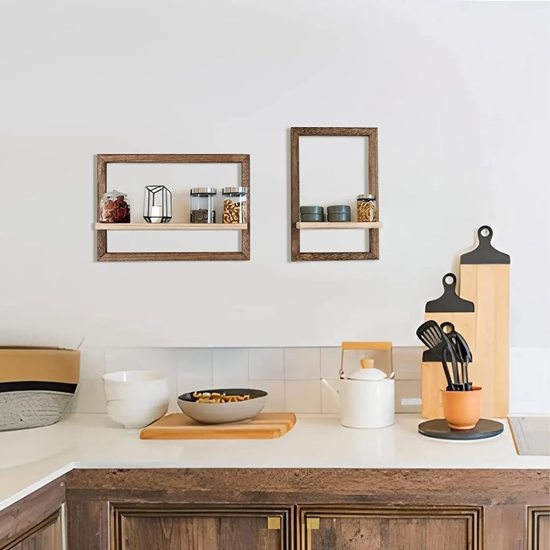 Kitchen counter with various utensils and decor items on a white wall background